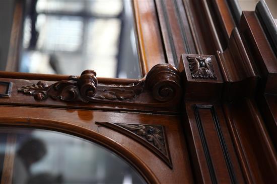 A Victorian ebony banded oak breakfront library bookcase, W.10ft D.1ft 9in. H.7ft 3in.